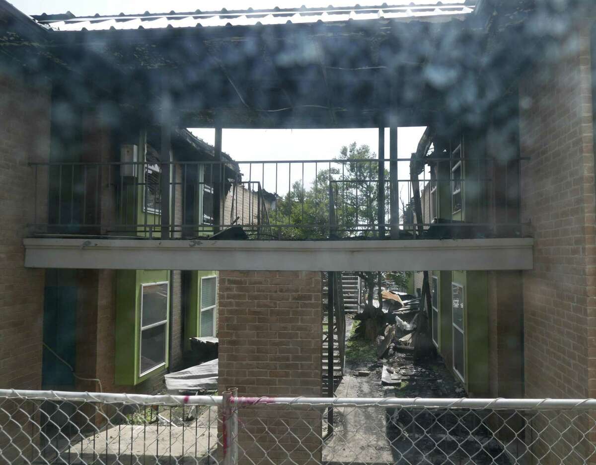 This is the view from the bedroom window of Bobbi Yanoviak's apartment in Building 100 at Iconic Village Apartments on Aug. 2, 2018. That building is separated by Building 300 from Building 500, which was destroyed by fire on July 20. Five people died there. Building 100 has reopened.