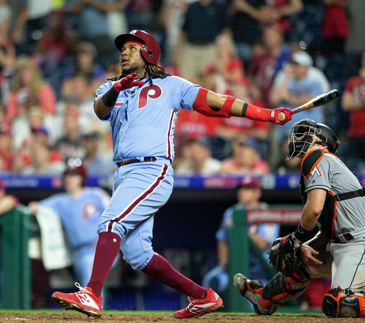 Philadelphia Phillies' Maikel Franco (7) watches his walk-off three-run home run against the Miami Marlins in a baseball game Thursday, Aug. 2, 2018, in Philadelphia. The Phillies won 5-2. (AP Photo/Laurence Kesterson)
