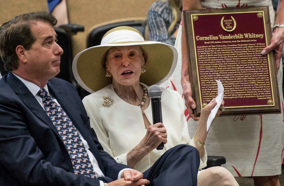 Mary Lou Whitney gives an acceptance speech for her late husband, C.V. Whitney's induction in to the Hall of Fame as a pillar of the industry during the 2018 induction ceremony for the National Museum of Racing and Hall of Fame held at the Finney Pavilion of the Fasig-Tipton Sales Company Friday Aug. 3, 2018 in Saratoga Springs, N.Y.(Skip Dickstein/Times Union)