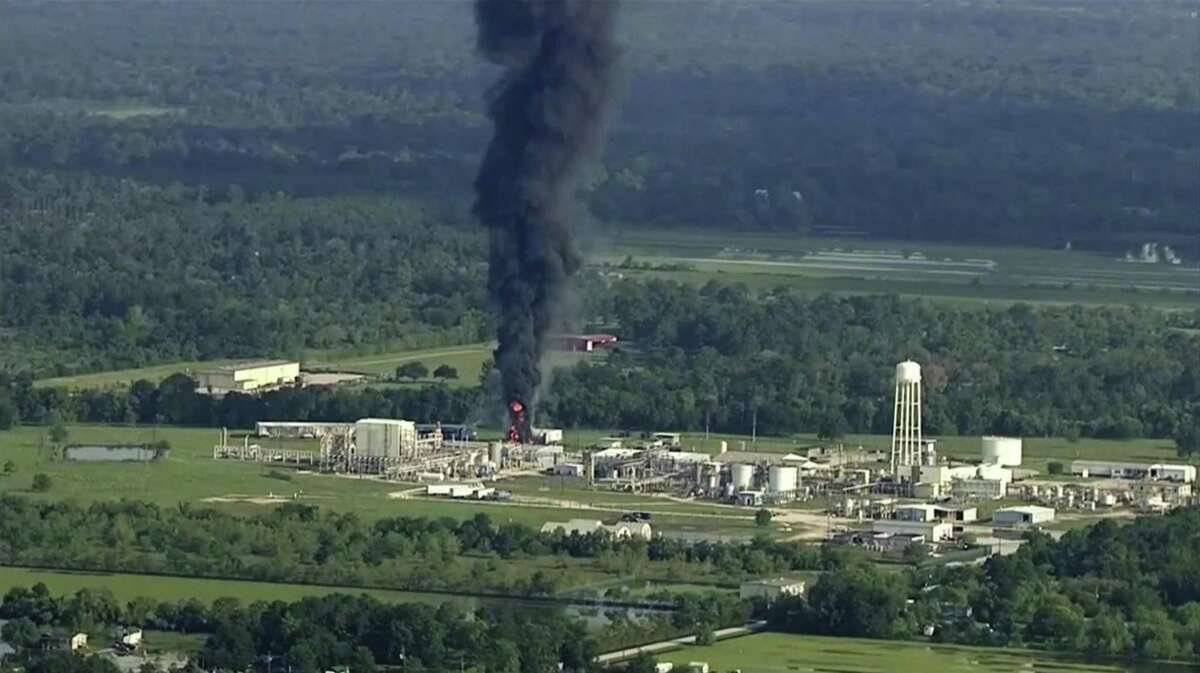 In this Sept. 1, 2017, file photo, smoke rises from the Arkema Inc. owned chemical plant in Crosby, near Houston, Texas. A Harris County grand jury on Friday indicted the French chemical company Arkema and two executives in connection with the release of toxic chemicals during the fire.