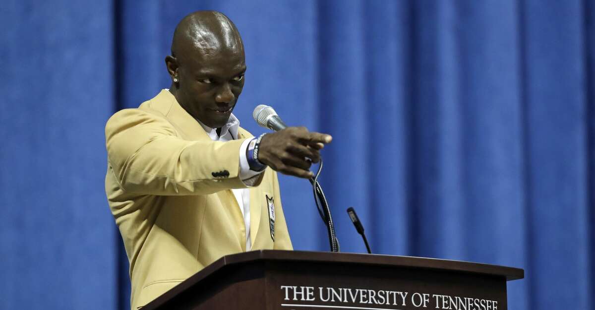 Former wide receiver Terrell Owens delivers his Pro Football Hall of Fame speech on Saturday, Aug. 4, 2018, in Chattanooga, Tenn. Instead of speaking at the Hall of Fame festivities in Canton, Ohio, Owens celebrated his induction at the University of Tennessee at Chattanooga, where he played football and basketball and ran track. (AP Photo/Mark Humphrey)