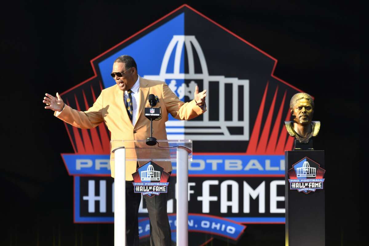 Former NFL player Robert Brazile delivers his speech during inductions at the Pro Football Hall of Fame on Saturday, Aug. 4, 2018, in Canton, Ohio. (AP Photo/David Richard)