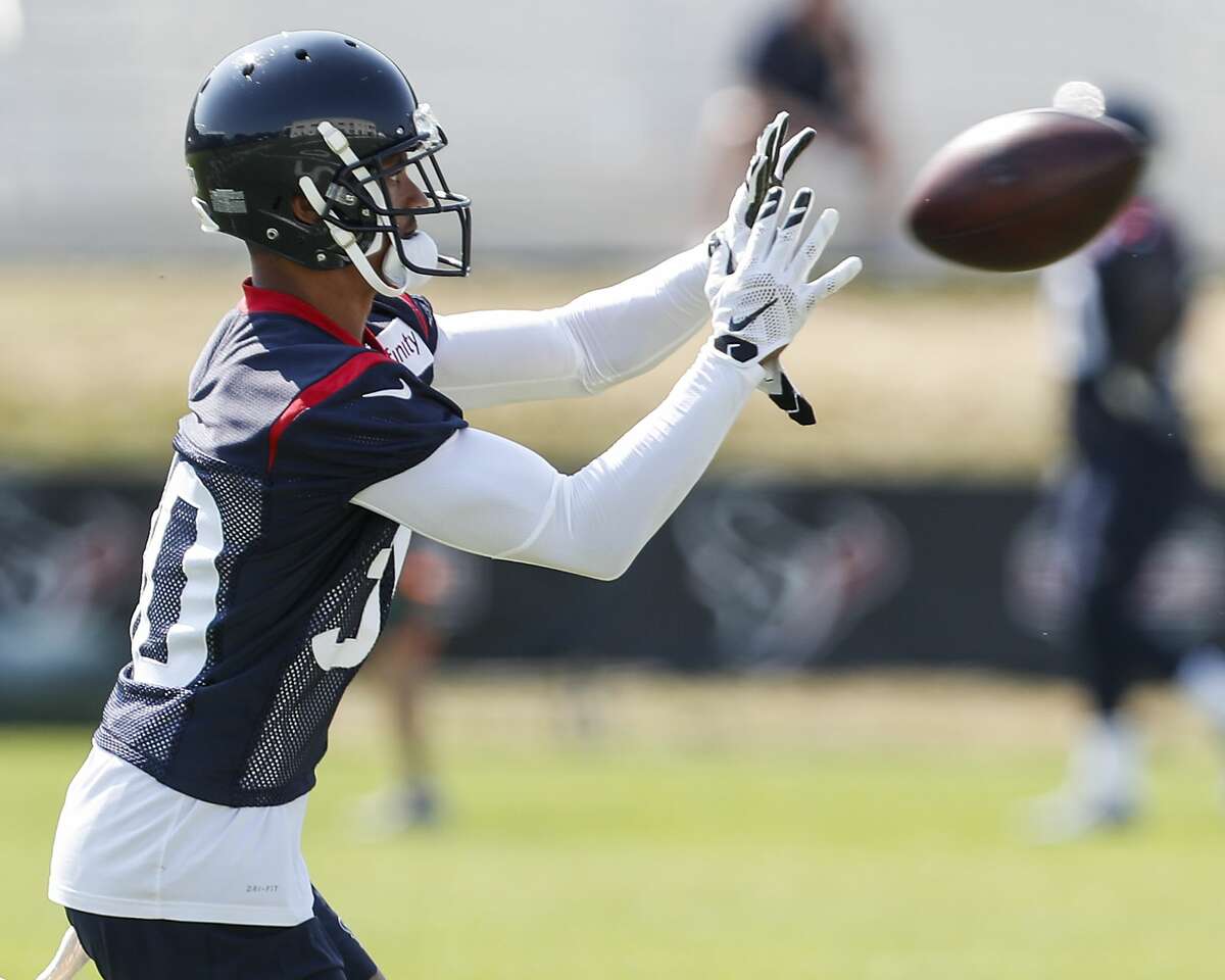 PHOTOS: 2018 NFL combine winners and losers  Houston Texans cornerback Kevin Johnson (30) reaches out to catch a football during training camp at the Greenbrier Sports Performance Center on Sunday, Aug. 5, 2018, in White Sulphur Springs, W.Va. >>>Look back at winners and losers from last year's NFL scouting combine ... 