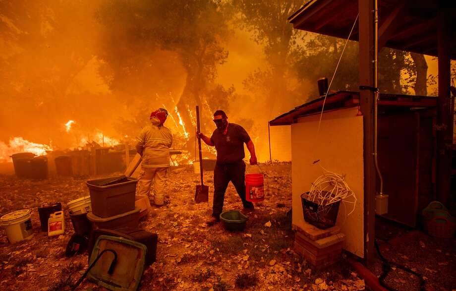 1) Mendocino Complex Fire, Colusa, Lake and Mendocino counties, July/August 2018Size: 290,692 acres, 454 square miles; half the size of Marin County, twice the size of Chicago and nearly 10 times the size of San Francisco(Photo: Resident Lane Lawder carries a water bucket while fighting to save his home from the Ranch Fire burning down New Long Valley Rd near Clearlake Oaks, California, on Saturday, August 4, 2018. The Ranch Fire is part of the Mendocino Complex, which is made up of two blazes, the River Fire and the Ranch Fire.) Photo: NOAH BERGER, AFP/Getty Images