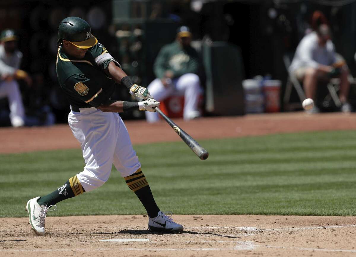 Khris Davis' fly ball hits roof in Houston, oddly caught for out – NBC  Sports Bay Area & California