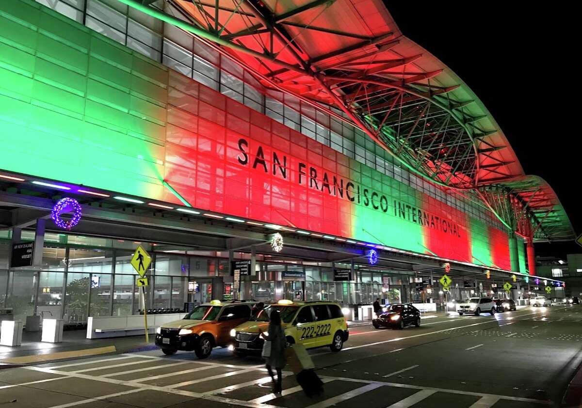 SFO all lit up in holiday colors.
