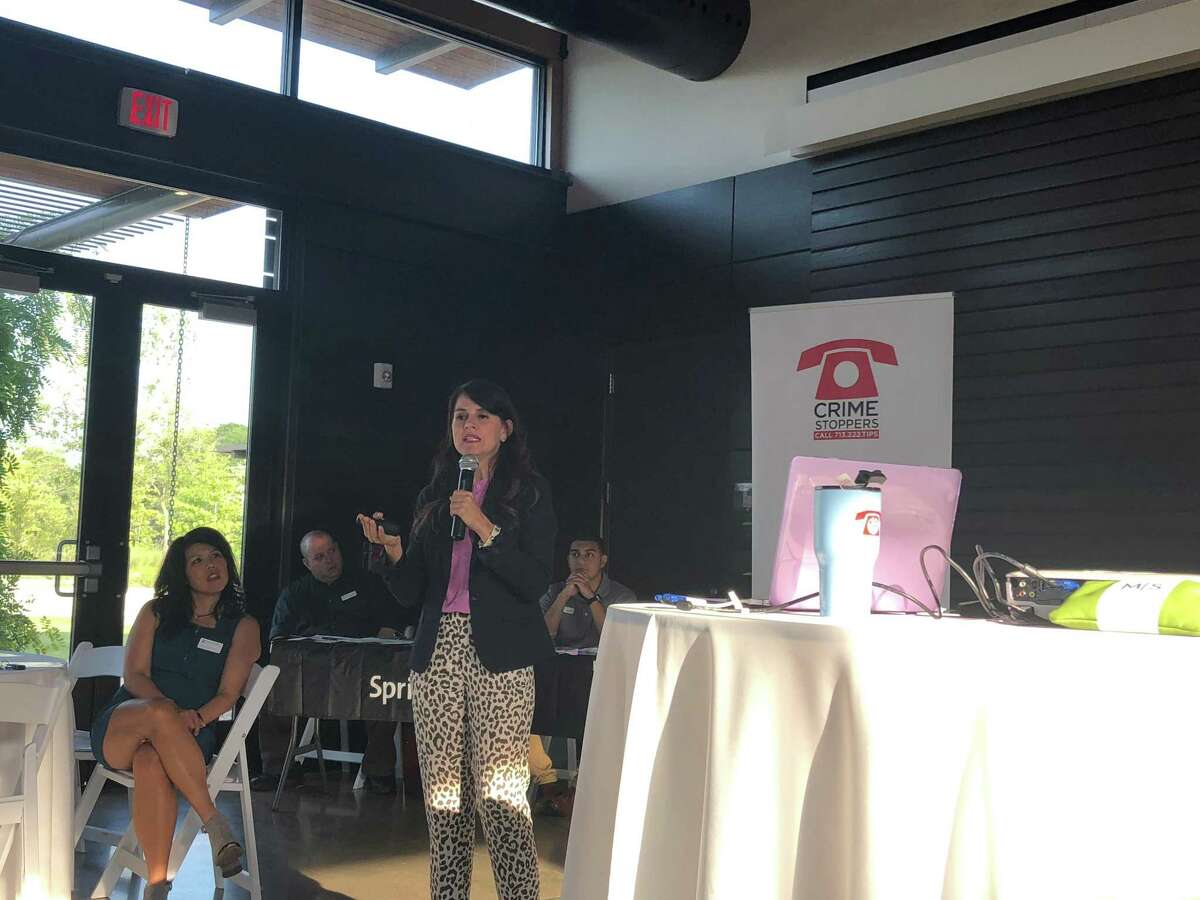 Michelle Sacks, Crime Stoppers Safe Schools Institute director, educates parents about how to keep their students safe online. In this file photo, Sacks speaks at a Evelyn's Park and Crime Stoppers of Houston Safety Series at the Park event on July 26, 2018.