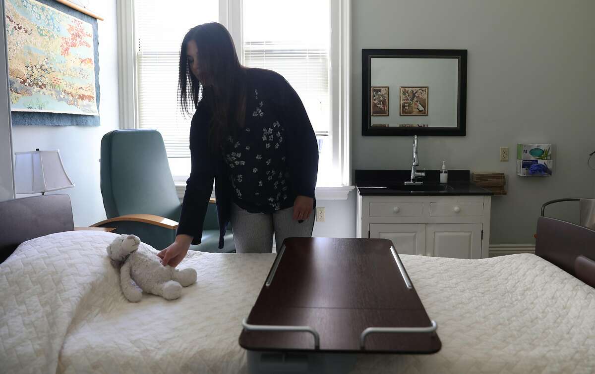 Director of guest house caregiving services Cassie Field shows one of the hospice rooms at the Zen Hospice Guest House on Monday, July 16, 2018 in San Francisco, Calif. The Zen Hospice Guest House which has provided people with a place to die in grace and dignity is shutting down after thirty years due to lack of revenue.