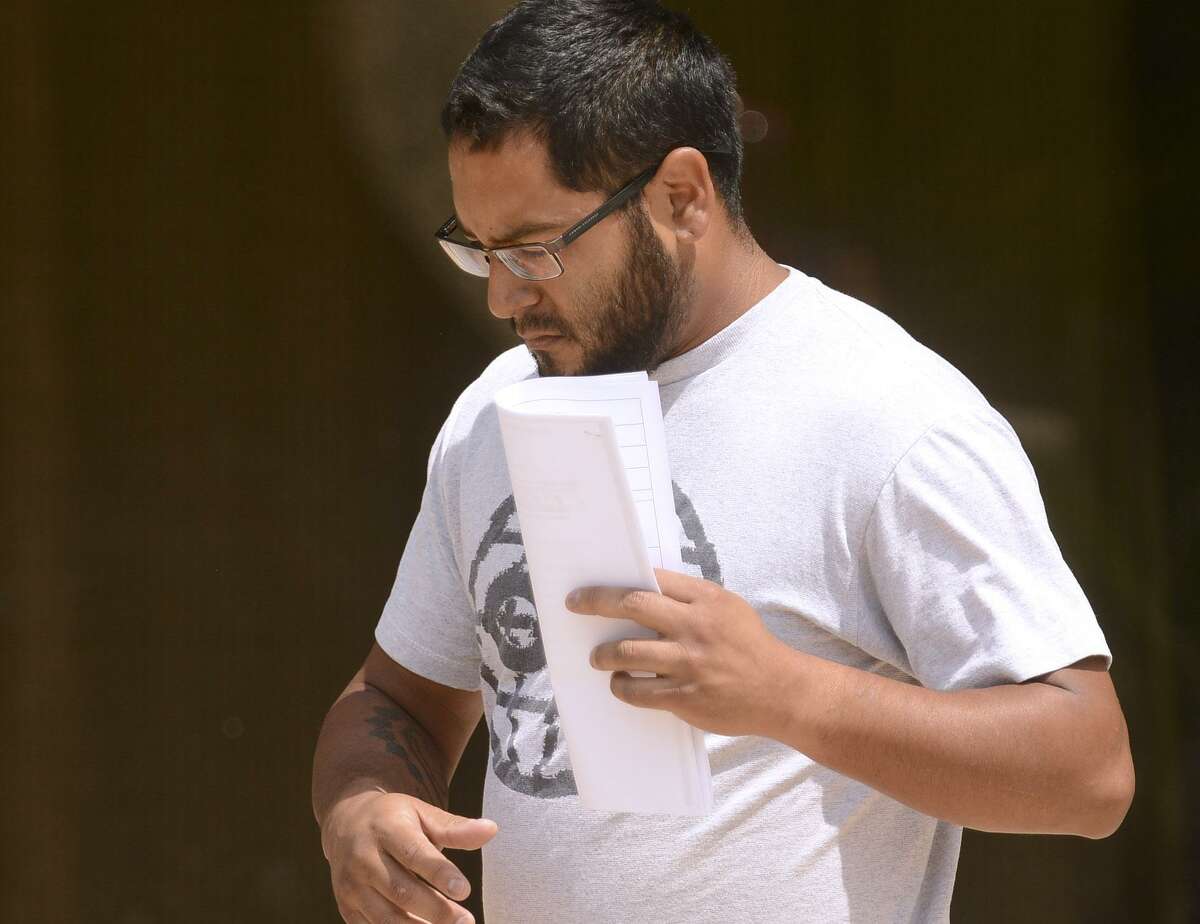Gabriel Robert Ortiz, 29, leaves the federal courthouse in San Antonio on Thursday, July 26, 2018. He and fellow former Bexar County Detention Center guard Ruben Hernandez, 26 have been arrested on federal charges for their alleged roles in helping bring drugs into the Bexar County jail.