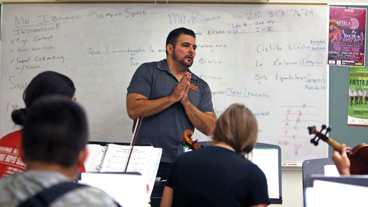Gumecindo “Gino” Rivera, who has been named traditional music director at the Guadalupe Academy, leads mariachi camp Monday. He has taught at the Guadalupe for 12 years.