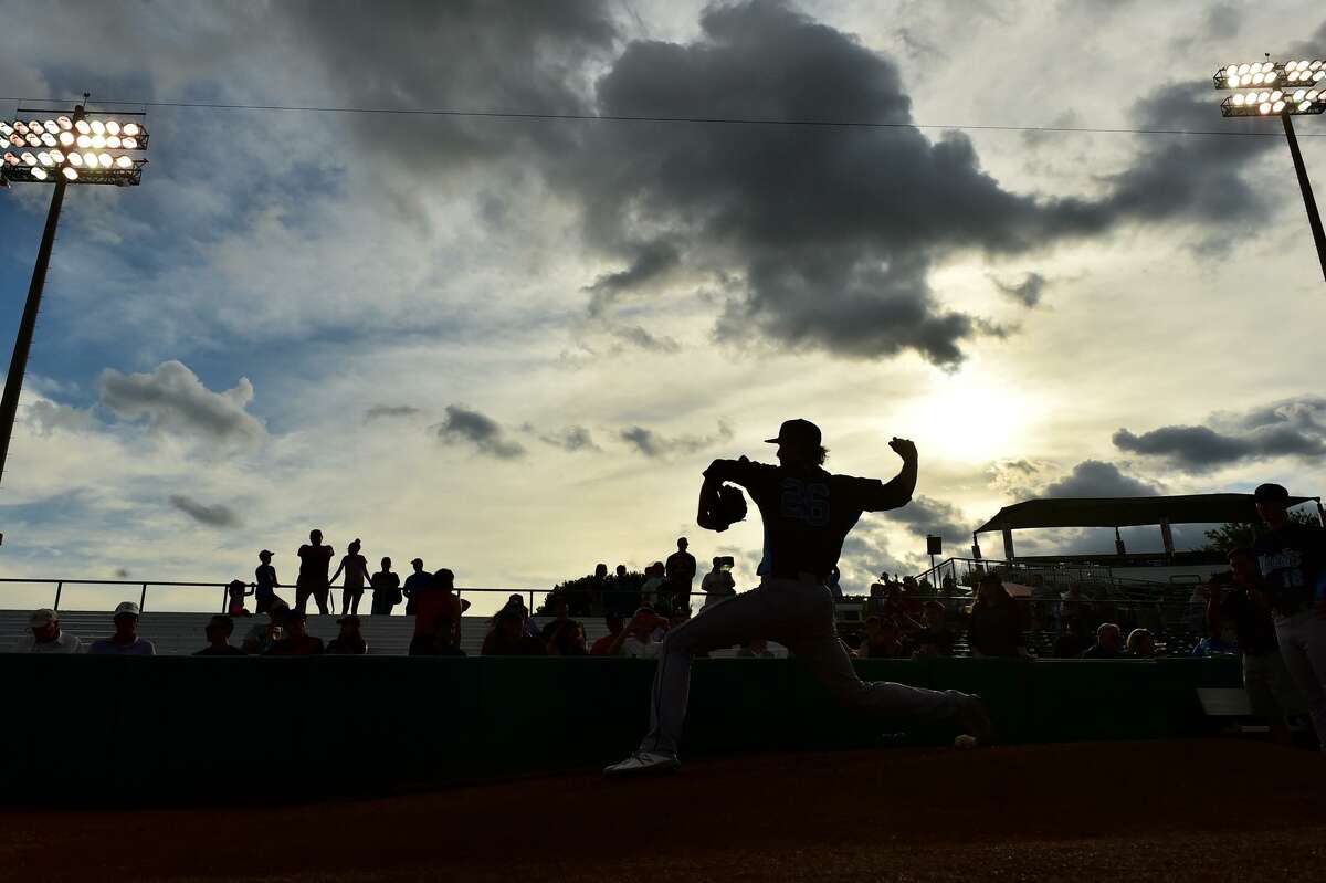 Forrest Whitley of the Corpus Christi Hooks warms up during his return to San Antonio to face the Missions Monday night