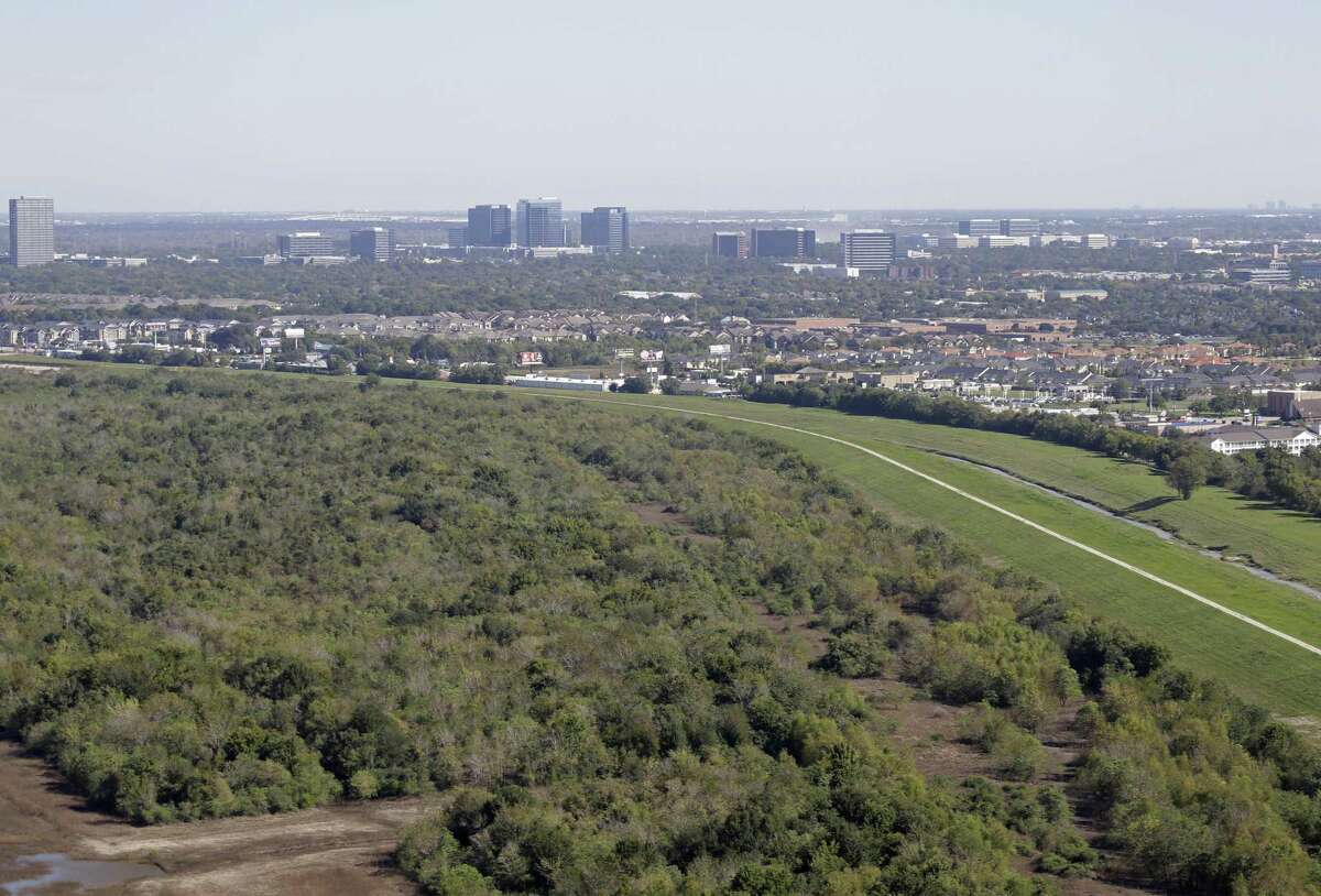An aerial view of Barker Reservoir near Westheimer Road is shown during a Houston Parks Board Bayou Greenways 2020 project tour in October 2017.