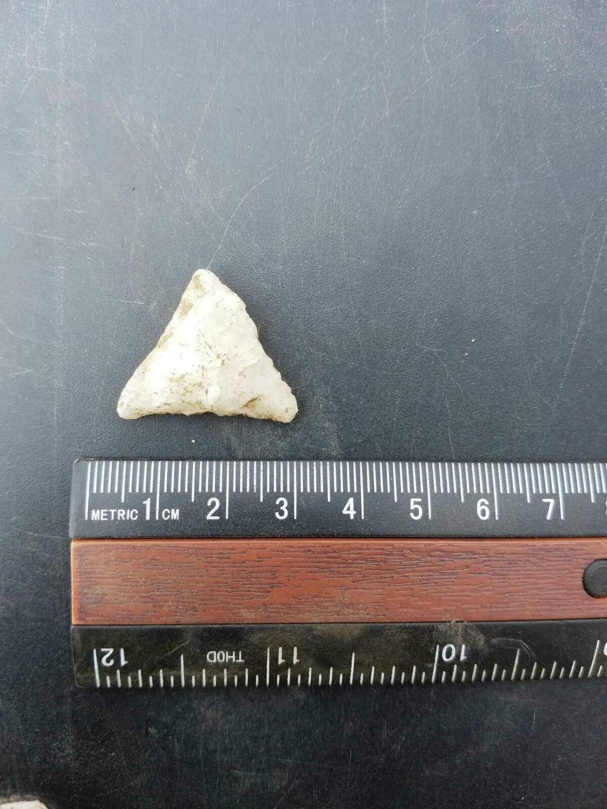 A quartz-point arrowhead unearthed at the Walk Bridge construction zone in East Norwalk.