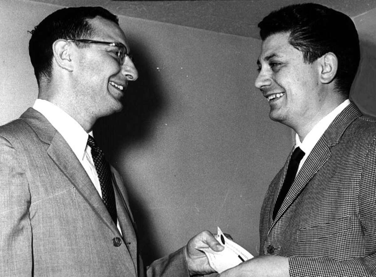 Robert Danzig, former Times Union publisher, with Joseph F. Nigro on May 21, 1965. (Times Union archive)