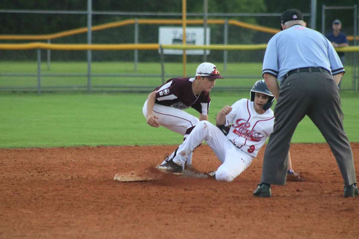 For the second consecutive summer, Pearland Little League has been eliminated by a team that wound up at the world-famous Little League World Series. It was Lufkin last summer and now Post Oak. Pictured is a Post Oak runner just beating the tag attempt by a Pearland East infielder during the Section 3 title game on July 8.