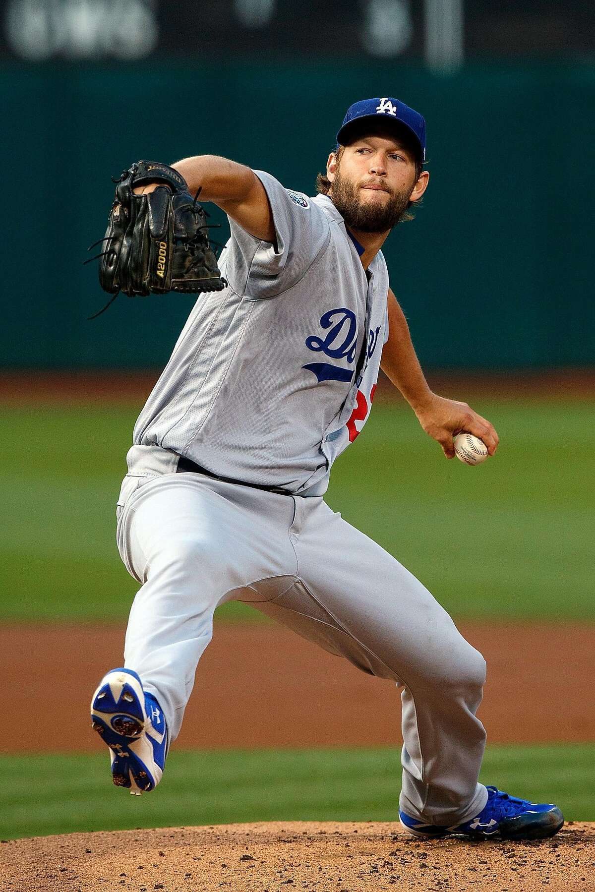 OAKLAND, CA - AUGUST 08: Clayton Kershaw #22 of the Los Angeles Dodgers pitches against the Oakland Athletics during the first inning at the Oakland Coliseum on August 8, 2018 in Oakland, California. (Photo by Jason O. Watson/Getty Images)