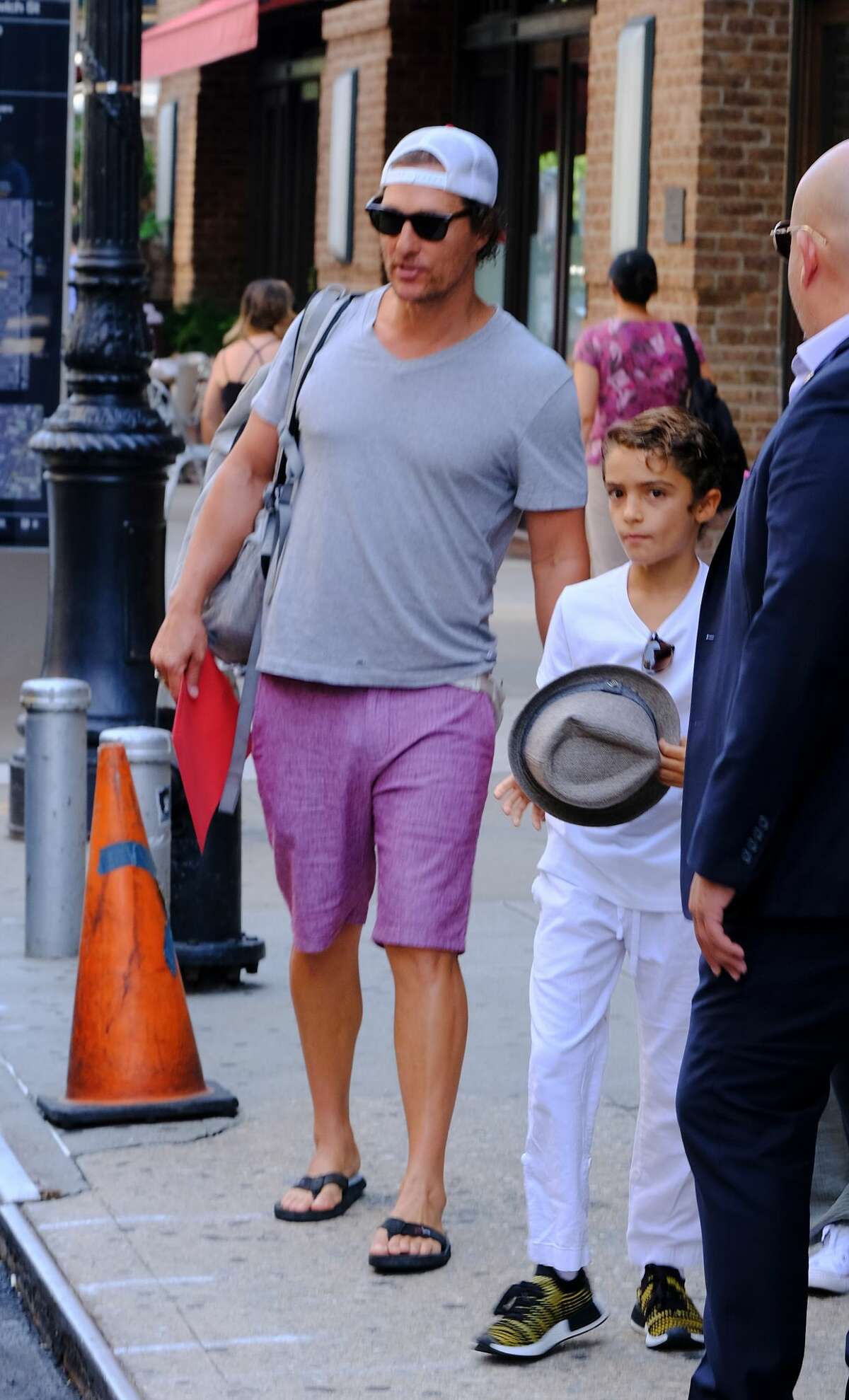 Matthew McConaughey looks like your typical dad next to his glammed up