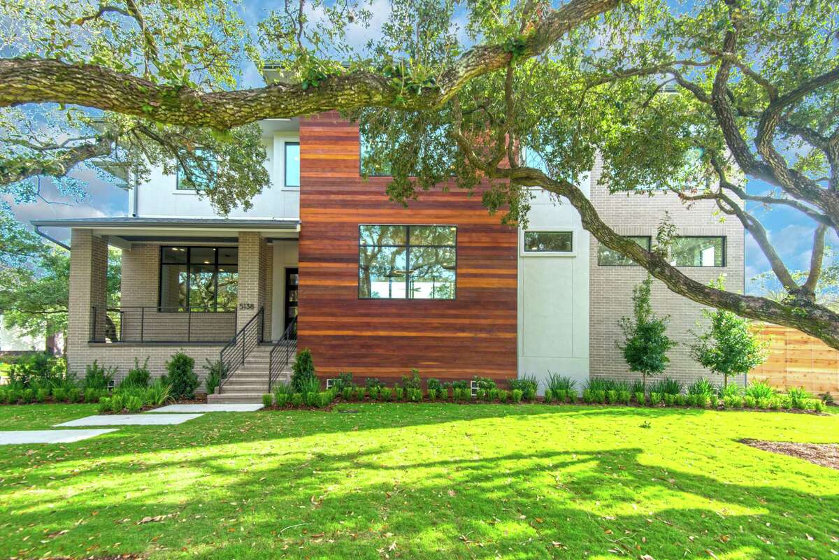 Brick and Cumaru wood make up much of the exterior of the Meyerland home of Cory and Carley Giovanelli. Their builder was On Point Custom Homes. The home will be on the Sept. 22 Modern Architecture + Design Society Home Tour.