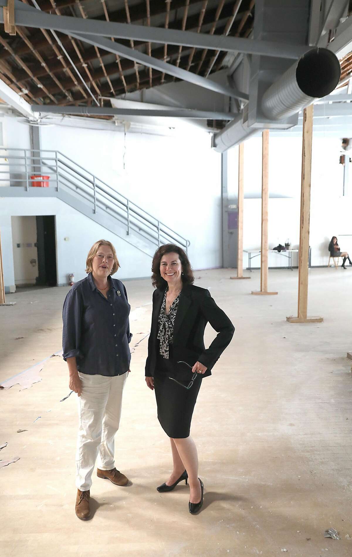 Smuin managing director Lori Laqua (left) and Smuin artistic director Celia Fushille (right) show their new headquarters and dance studio on Tuesday, Aug. 7, 2018 in San Francisco, Calif. Smuin Ballet is celebrating its upcoming 25th anniversary and buying the old Metronome Ballroom on Potrero Hill to convert into its headquarters and dance studio.