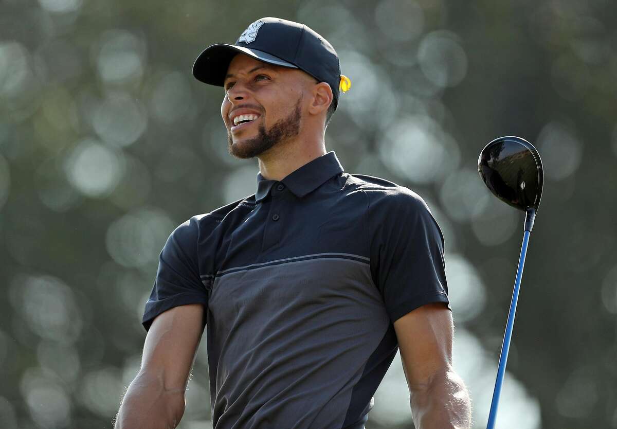 Golden State Warriors' Stephen Curry tees off on 11th hole during 1st round of Ellie Mae Classic at TPC Stonebrae in Hayward, Calif. on Thursday, August 9, 2018.