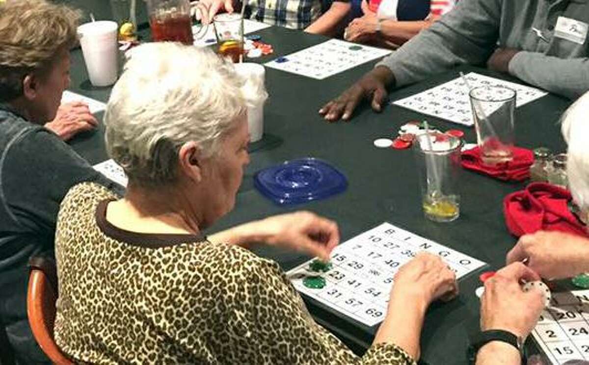 PHOTOS: More about dementia and Alzheimer's People play bingo during a monthly dinner hosted by the Kingwood Memory Cafe. Learn the facts about Alzheimer's ...