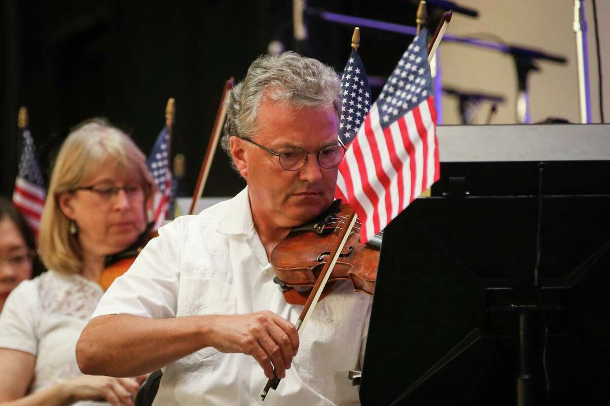 Eric Halen, Co-Concertmaster of the Houston Symphony, plays during the Star Spangled Salute on Tuesday, July 3, at the Cynthia Woods Mitchell Pavilion.