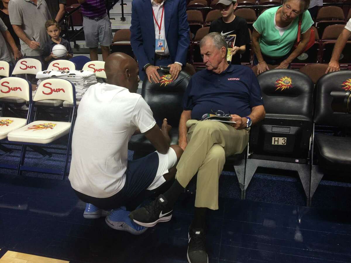 Former UConn star Ray Allen speaks with his former Huskies coach, Jim Calhoun, at the Jim Calhoun Celebrity Classic Charity All-Star Game on Friday.