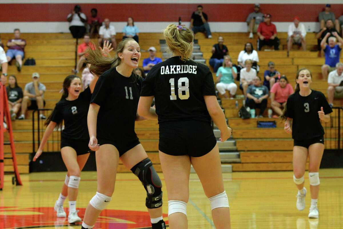 The Oak Ridge team celebrates a point in the second set of the Gold Bracket championship match between the Oak Ridge War Eagles and the Klein Bearkats during the of the 2018 Katy / Cy-Fair Volleyball Classic on August 11, 2018 at Katy High School, Katy, TX.