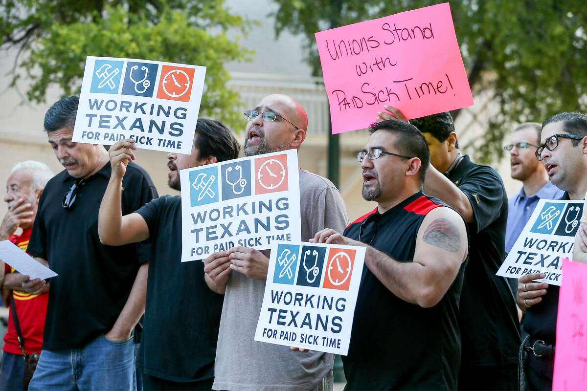 Members of Working Texans for Paid Sick Time rally in front of City Hall before the City Council meets about a proposal for mandatory paid sick leave Aug. 2, 2018.