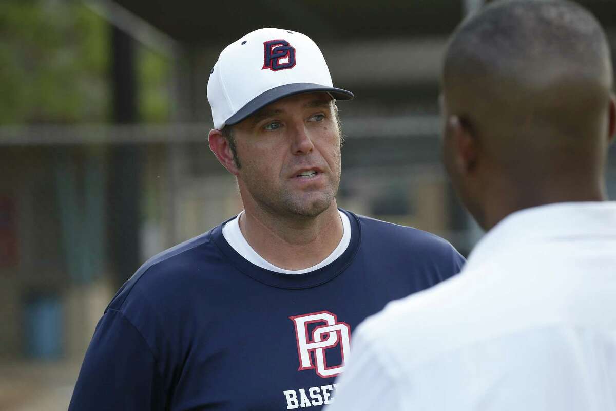 Post Oak Little League team coach David Rook is interviewed at the team's home field in advanced to the Little League World Series on Thursday, Aug. 9, in Houston.