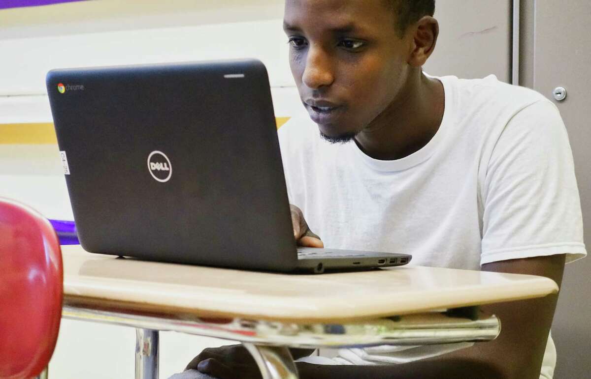 Student Ibrahim Ali works on an APEX online course at Hackett Middle School on Monday, Aug. 13, 2018, in Albany, N.Y. (Paul Buckowski/Times Union)
