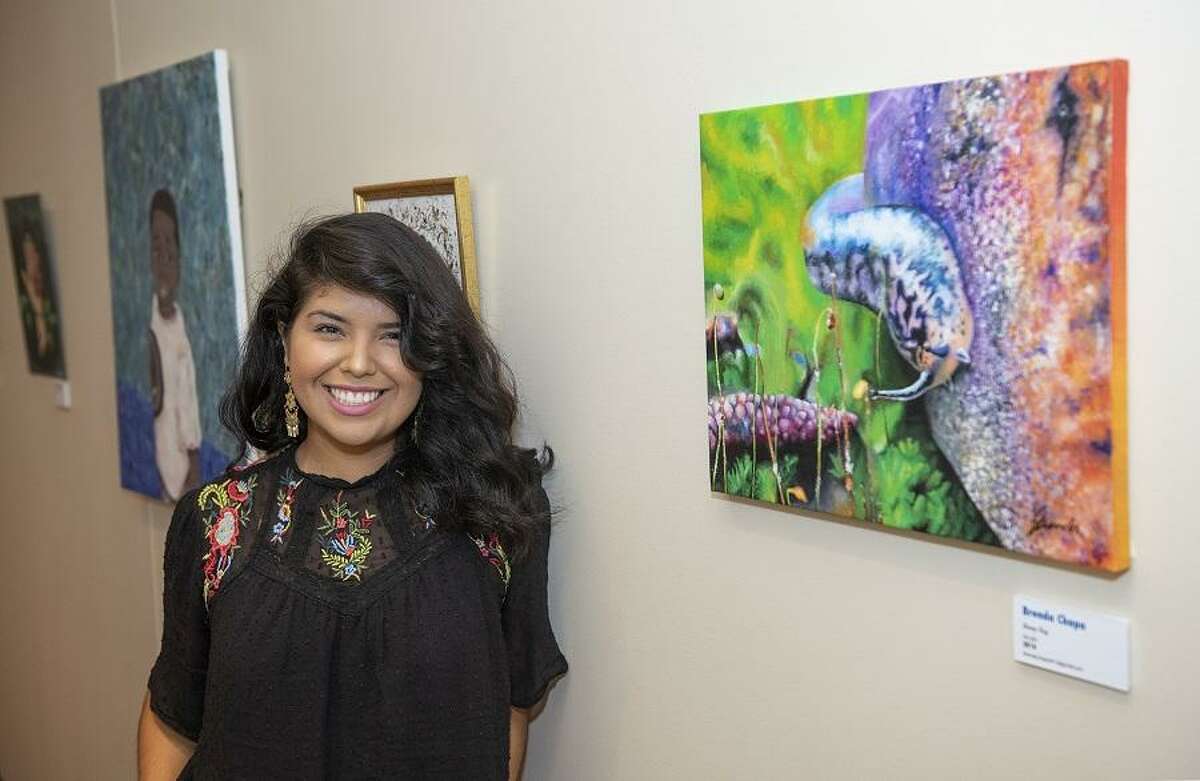 Saint Arnold’s Brewing Company is showcasing artwork from students at the University of Houston-Downtown. Shown here is Brenda Chapa.