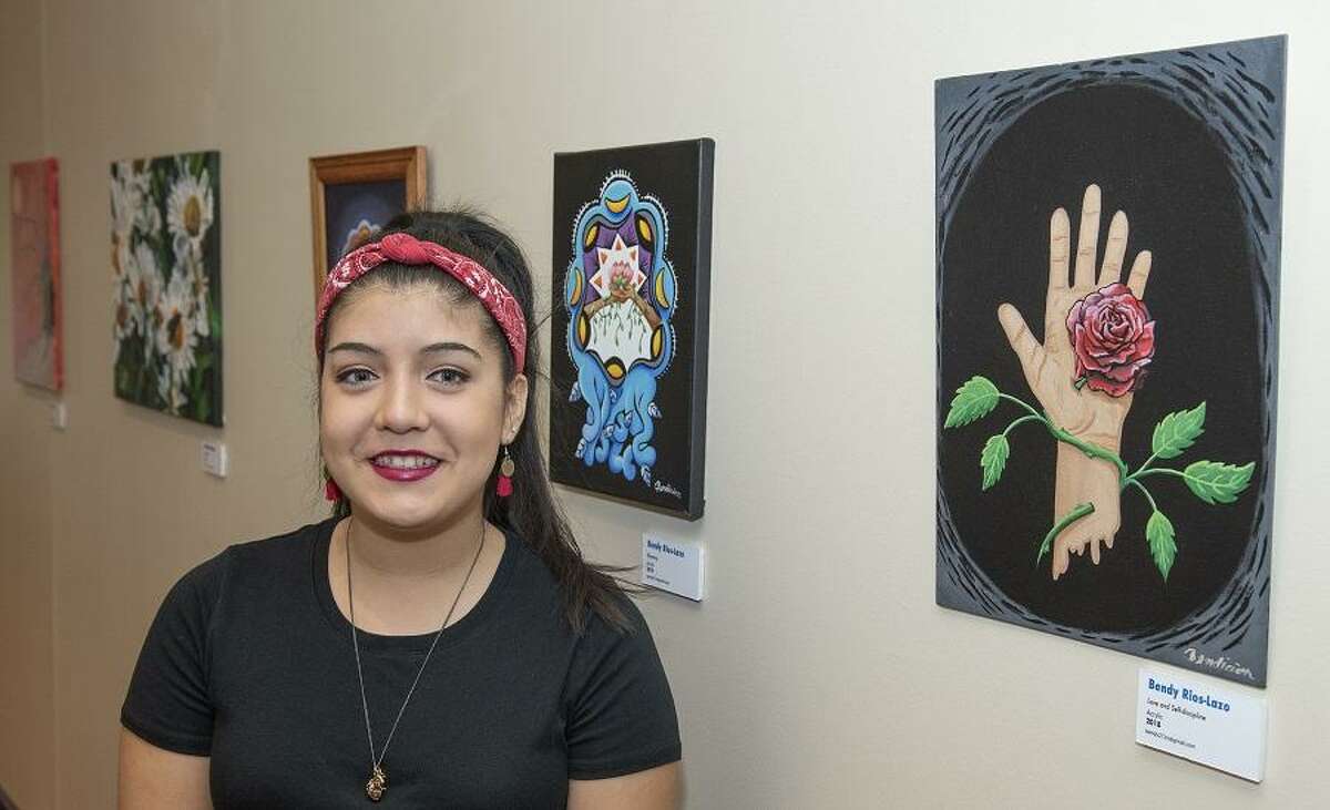 Saint Arnold’s Brewing Company is showcasing artwork from students at the University of Houston-Downtown. Shown here is Bendi Rios-Lazo.