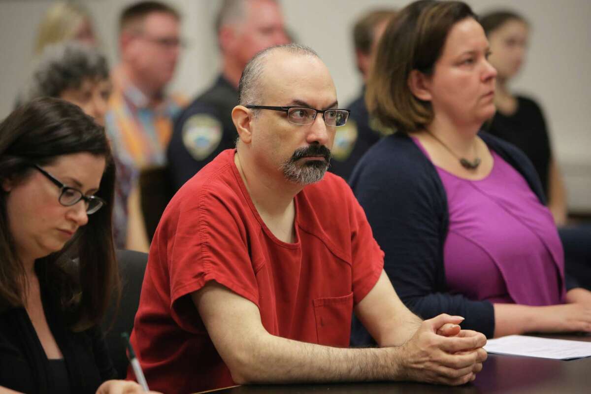 Daniel Amador was sentenced to 23 years to life in prison Friday for the serial sexual abuse of his two children. Amador is a former Seattle police officer who resigned two months after his 2016 arrest. Photographed here during a pre-sentencing hearing, July 13, 2018.