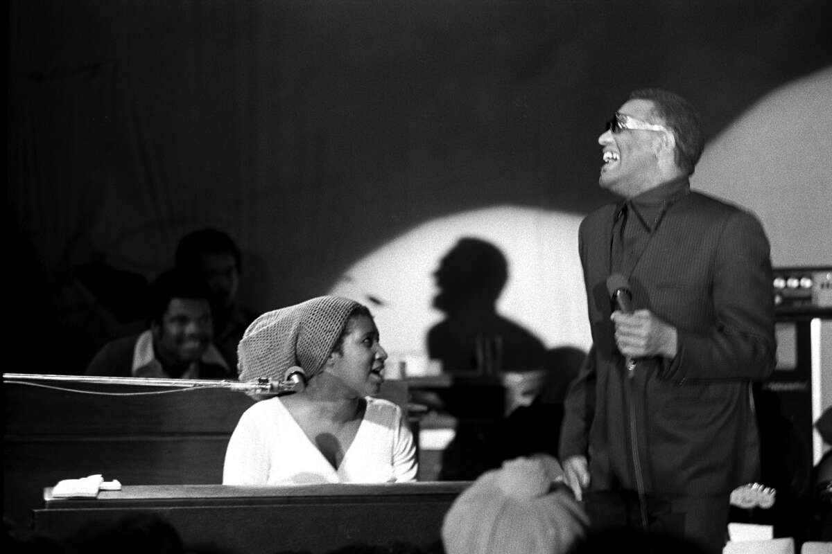 Aretha Franklin and Ray Charles perform onstage at the Fillmore West in February, 1971 in San Francisco.