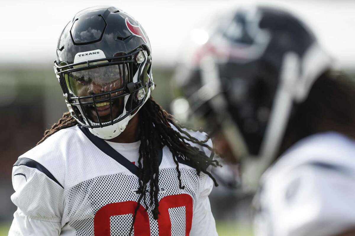 Houston Texans defensive end Jadeveon Clowney (90) finishes a drill during training camp at the Methodist Training Center on Monday, Aug. 13, 2018, in Houston.