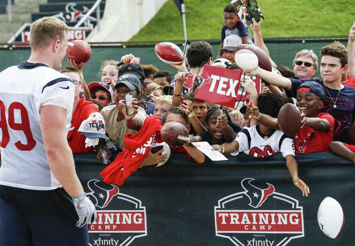 PHOTOS: Texans H-E-B commercials 2019  Houston Texans defensive end J.J. Watt (99) walks up to a group of fans to sign autographs during training camp at the Methodist Training Center on Monday, Aug. 13, 2018, in Houston.  >>>Browse through the photos for a preview of the Texans' new H-E-B commercials ... 