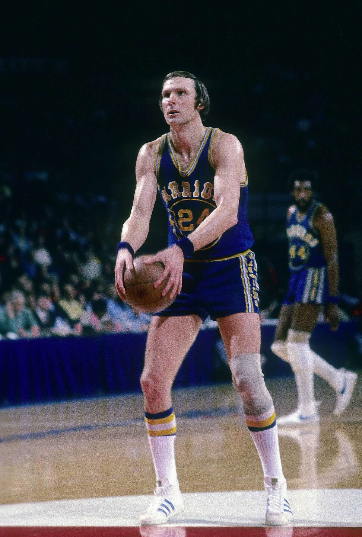 BALTIMORE, MD - CIRCA 1974: Rick Barry #24 of the Golden State Warriors is at the free-throw line against the Washington Bullets during a circa 1974 NBA basketball game at the Capital Center in Baltimore, Maryland. Barry played for the Warriors from 1972 - 77. (Photo by Focus on Sport/Getty Images)