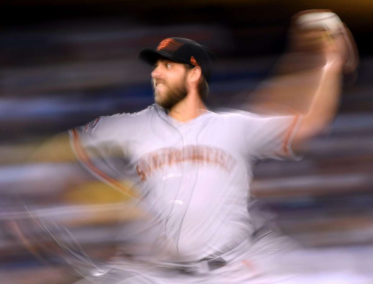 LOS ANGELES, CA - AUGUST 13: Madison Bumgarner #40 of the San Francisco Giants pitches during the third inning against the Los Angeles Dodgers during the first inning at Dodger Stadium on August 13, 2018 in Los Angeles, California. (Photo by Harry How/Getty Images)