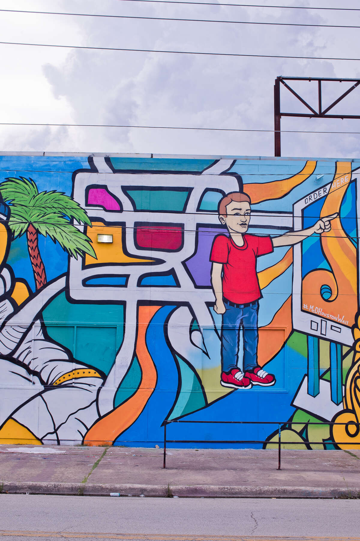 New mural in EaDo mixes McDonald's with Houston city life