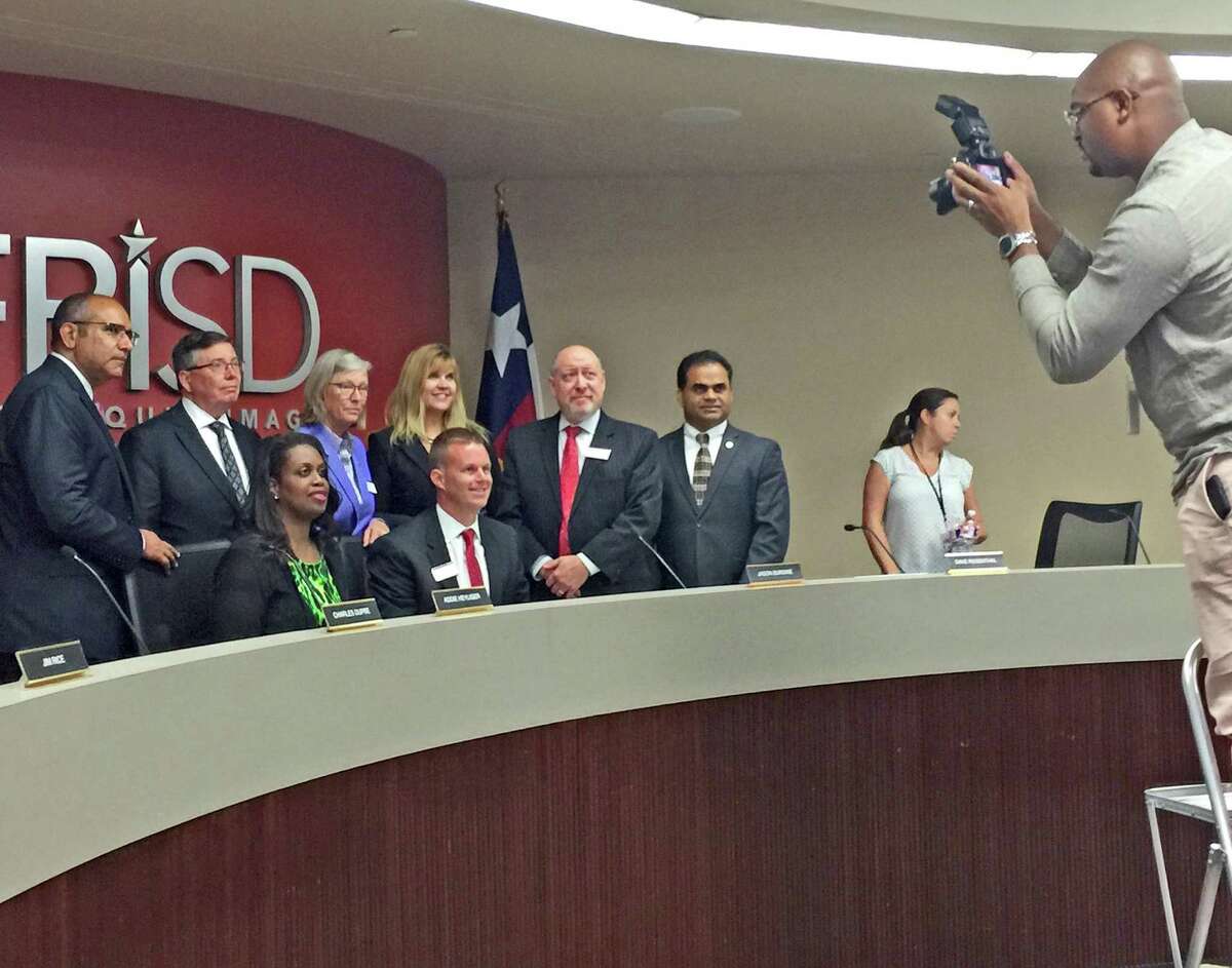 Fort Bend ISD trustees pose for a photograph after board members approved the largest school bond proposal in the district’s history on Monday, Aug. 13. Voters will decide the $992.6 million bond package in November.
