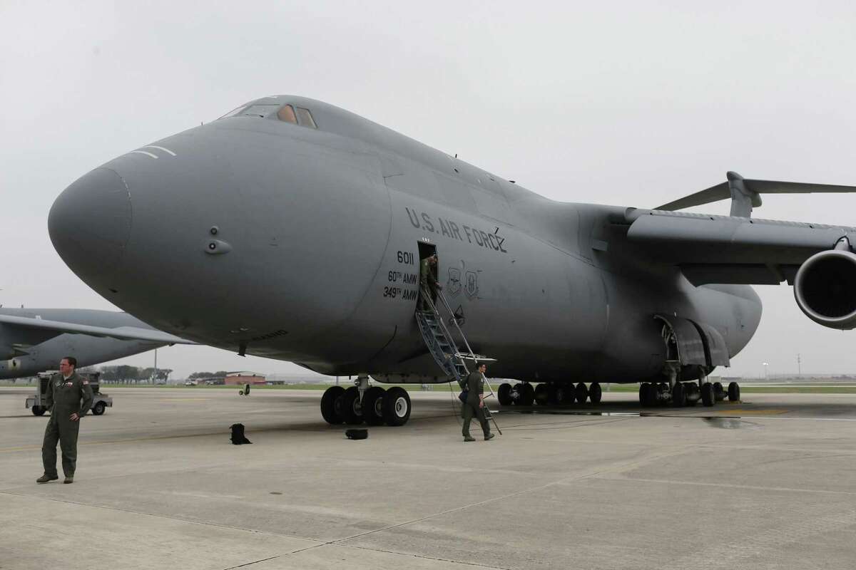 Air Force Reserve crewmembers board a C5-M Super Galaxy before a 2017 flight at Joint Base San Antonio-Lackland. A video has surfaced of the Air Force’s largest cargo plane making a rare landing without its nose gear in March in San Antonio.