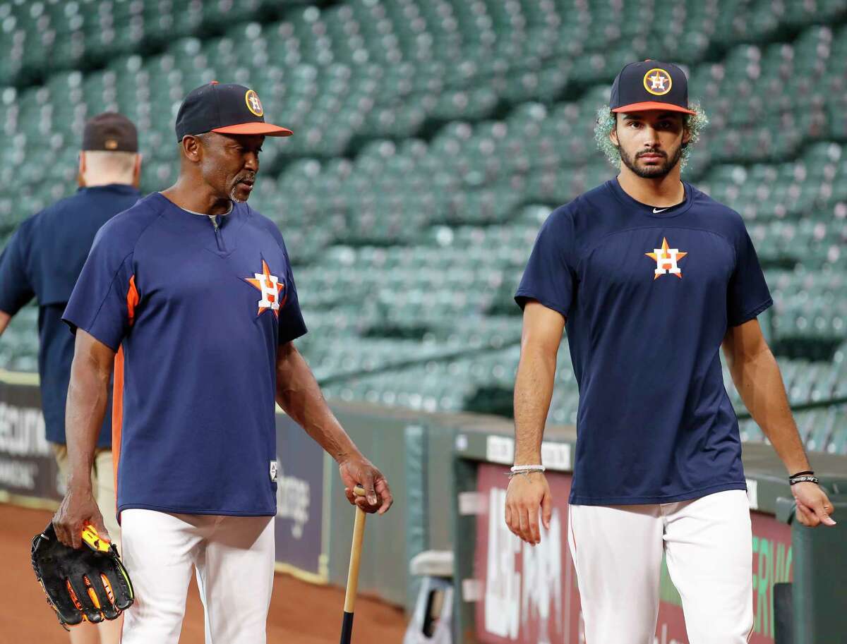 PHOTOS: A look at Dante Pettis during Astros batting practice on Tuesday Houston Astros third base coach Gary Pettis, left, with his son, Dante Pettis, who was the second round draft pick for the San Francisco 49ers during batting practice before the start of an MLB game at Minute Maid Park, Tuesday, August 14, 2018, in Houston.