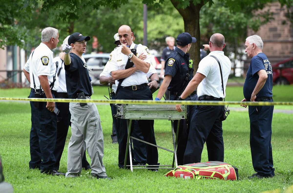 Emergency personnel respond to overdose cases on the New Haven Green on August 15, 2018.