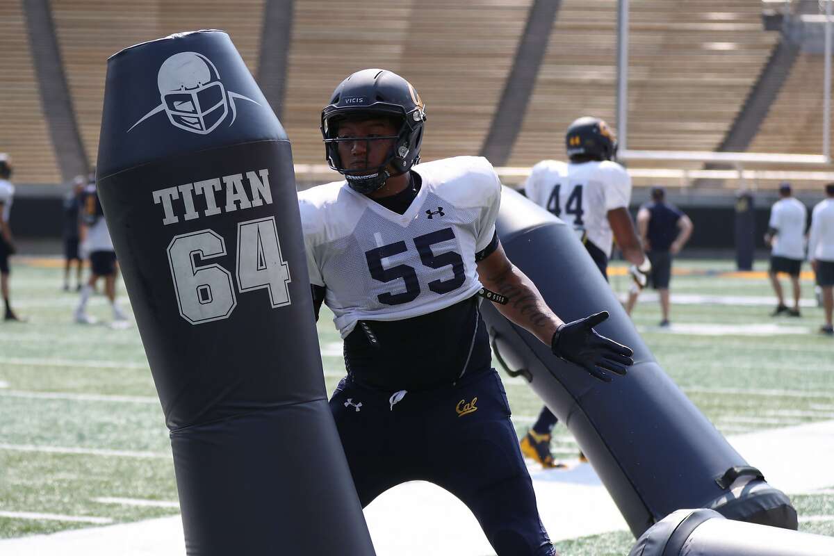 Cal defensive lineman Lone Toailoa practices his pass-rushing moves during training camp.