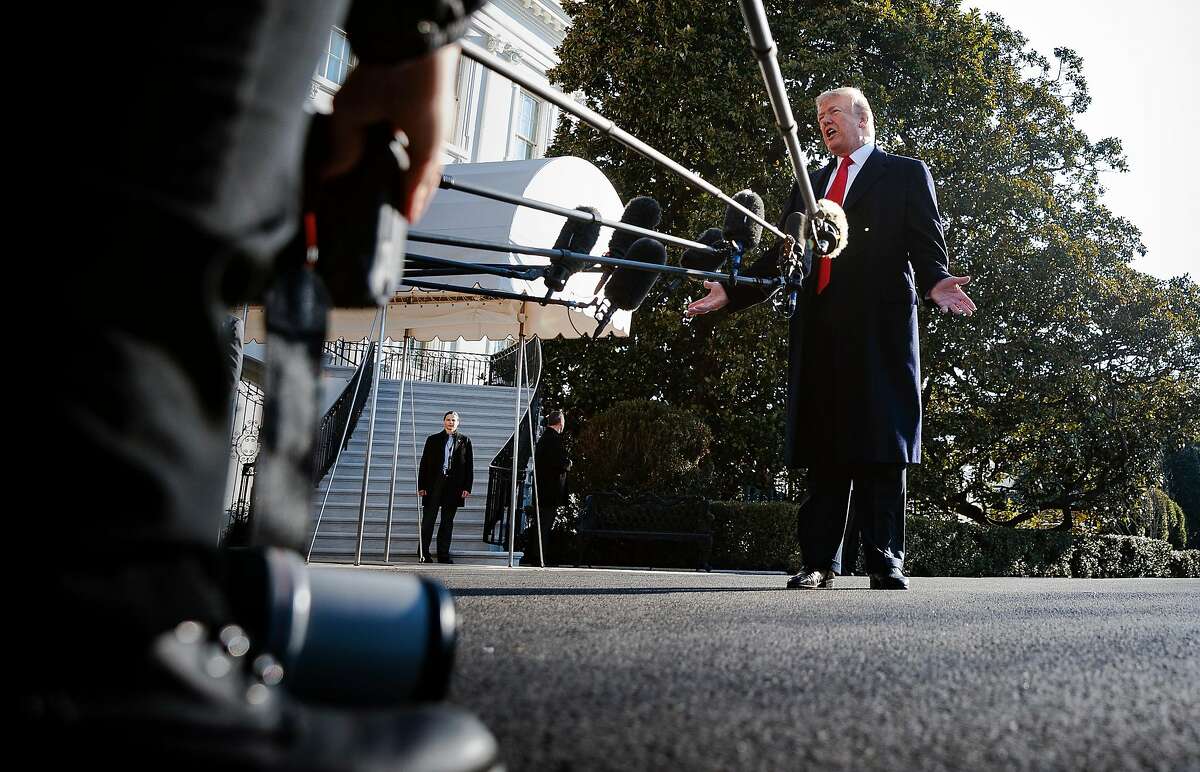 FILE -- President Donald Trump takes questions from reporters outside the White House, in Washington, March 13, 2018. More than 200 newspapers, including The New York Times, have committed to publishing editorials on the same day � Aug. 16, 2018 � on the dangers of the Trump administration�s assault on the press. (Tom Brenner/The New York Times)