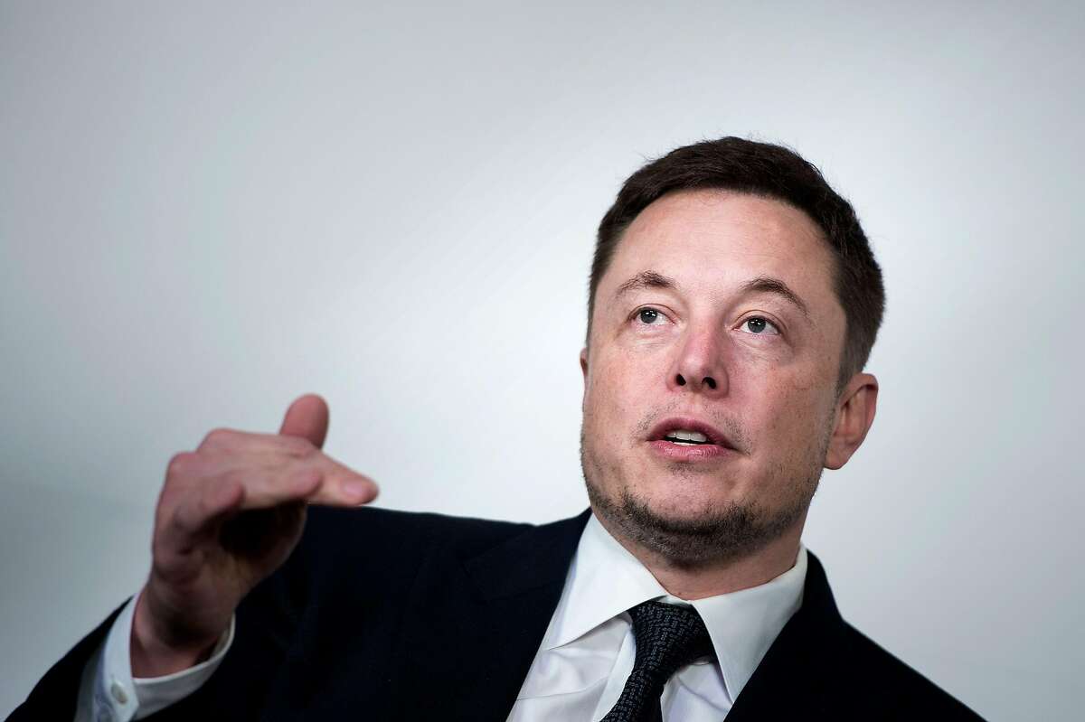 In this file photo taken on July 19, 2017, Elon Musk, CEO of SpaceX and Tesla, speaks during the International Space Station Research and Development Conference at the Omni Shoreham Hotel in Washington, DC. - Shares of Tesla fell Wednesday, August 15, 2018, following reports US securities regulators have subpoenaed the electric car maker's Chief Executive Elon Musk over his statements about taking the company private. Shares finished down 2.6 percent at $338.69 after news of the formal demand for information was published by Fox Business and The New York Times. Shares fell as much as 4.5 percent earlier in the session. The development suggests the oversight by the US Securities and Exchange Commission -- which was characterized in previous news articles as an inquiry -- has "advanced to a more formal, serious stage," said The Times, which cited a person familiar with the matter.