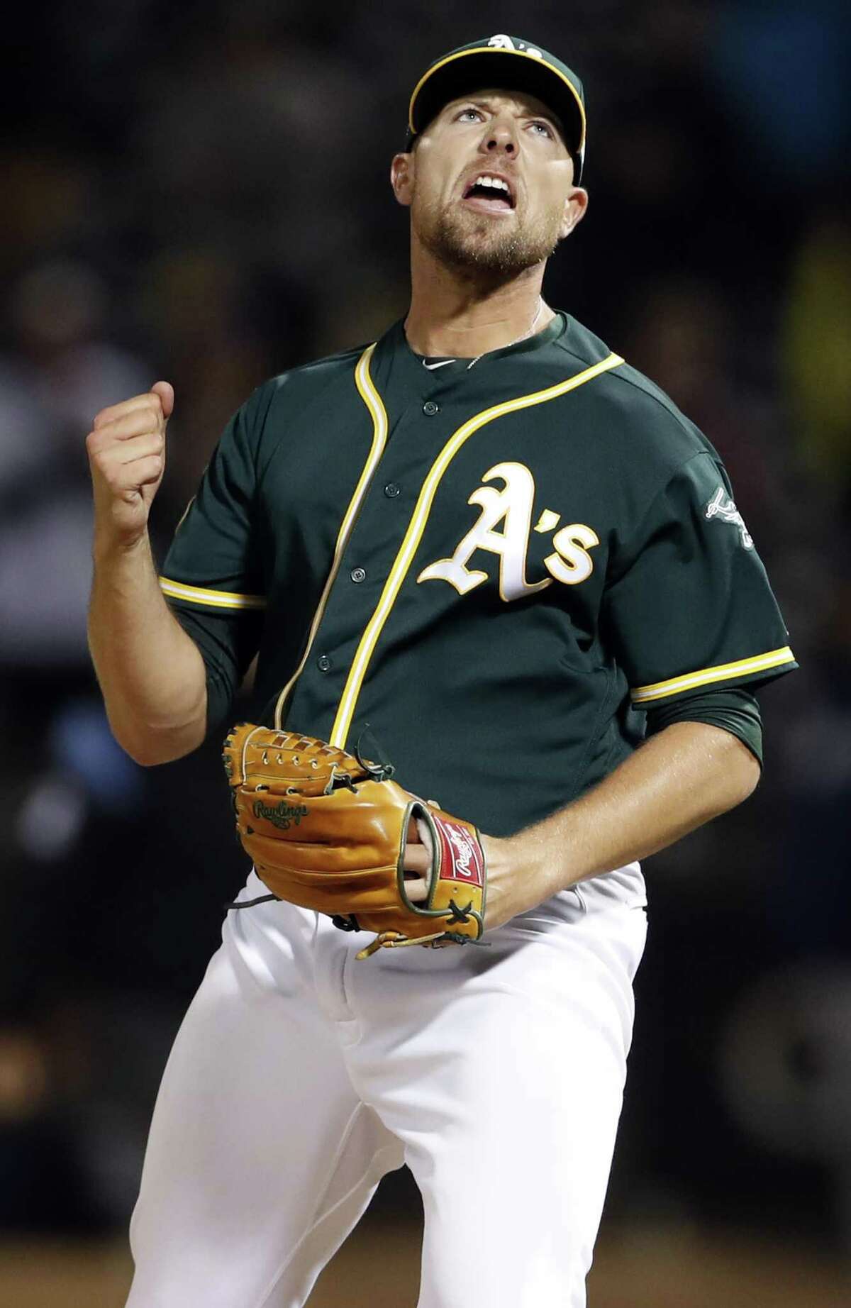 Oakland Athletics' Blake Treinen celebrates striking out Seattle Mariners' Nelson Cruz with the tying and go ahead runs on base to end A's 7-6 win in MLB game at Oakland Coliseum in Oakland, Calif. on Monday, August 13, 2018.