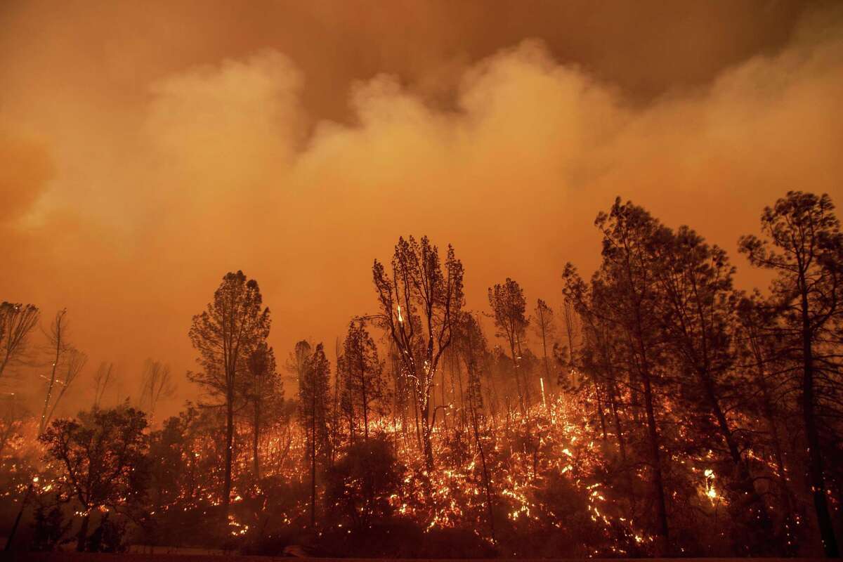 The Carr Fire burns along Highway 299 in Redding, Calif., on Thursday, July 26, 2018.While the state’s biggest and most destructive wildfires have been extinguished or largely encircled, firefighters continue to battle blazes in mostly rural areas of Northern California.