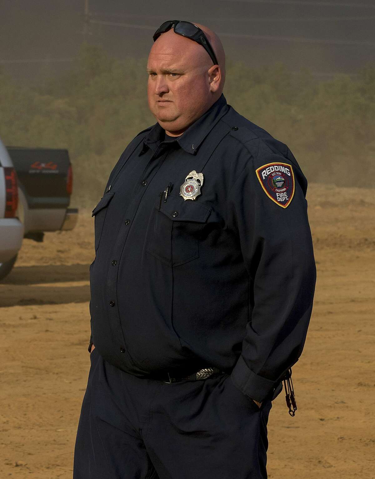 FILE - This Thursday, June 26, 2018, file photo released by Casey Lansdon shows Redding fire inspector Jeremy Stoke in Redding, Calif. The California Department of Forestry and Fire Protection says in a report that Redding firefighter Stoke died after he was enveloped in seconds by a fire tornado with a base the size of three football fields and winds up to 165 mph. Stoke died July 26, while helping people to evacuate a Northern California blaze. (Casey Lansdon via AP, File)